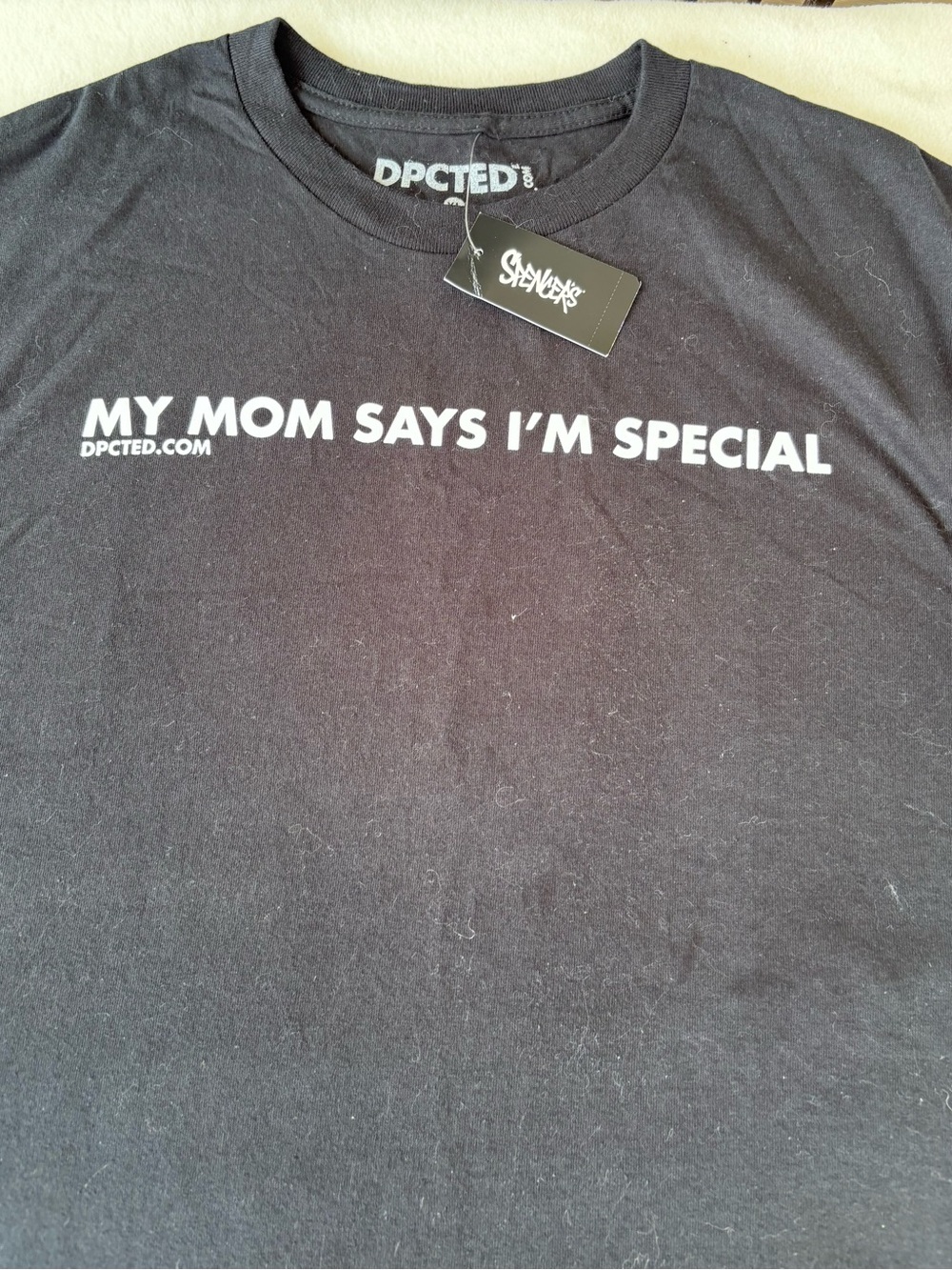 Spencer's Black Tee with White "My Mom Says I'm Special" Graphic